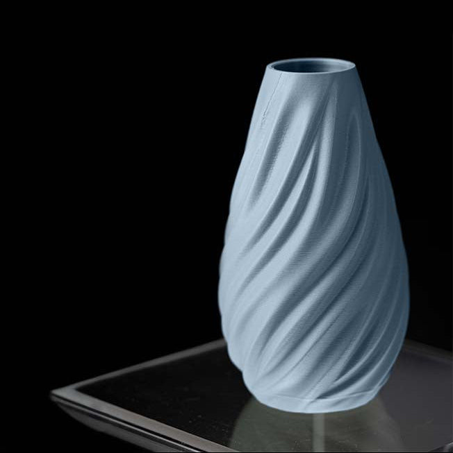 Vaso di design sinuoso in PLA ecologico BLU PASTELLO