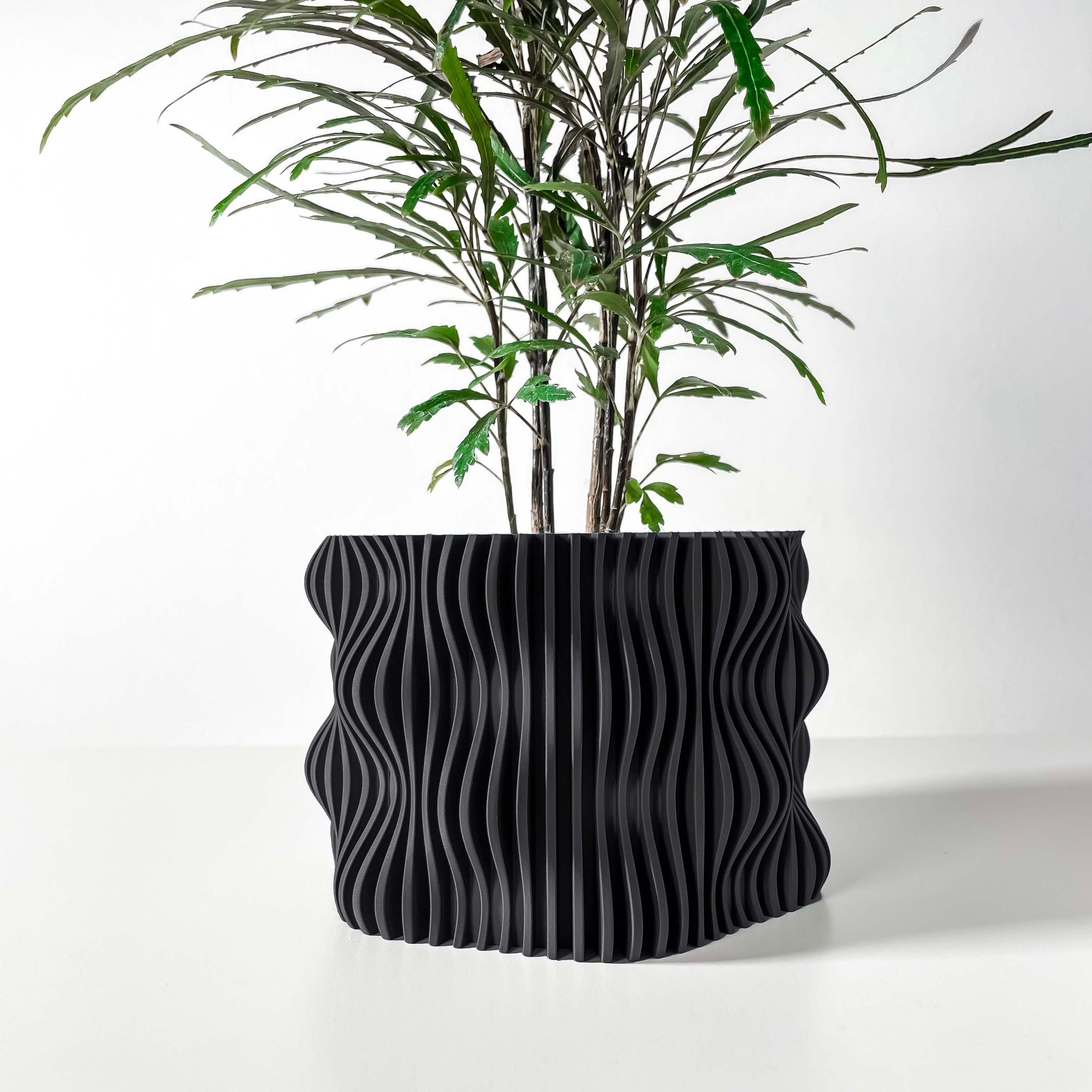 Portafiori nero. Vasetto d'arredo per case arredate con stile