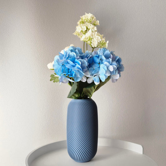 Vaso blu per l'arredamento delle case moderne