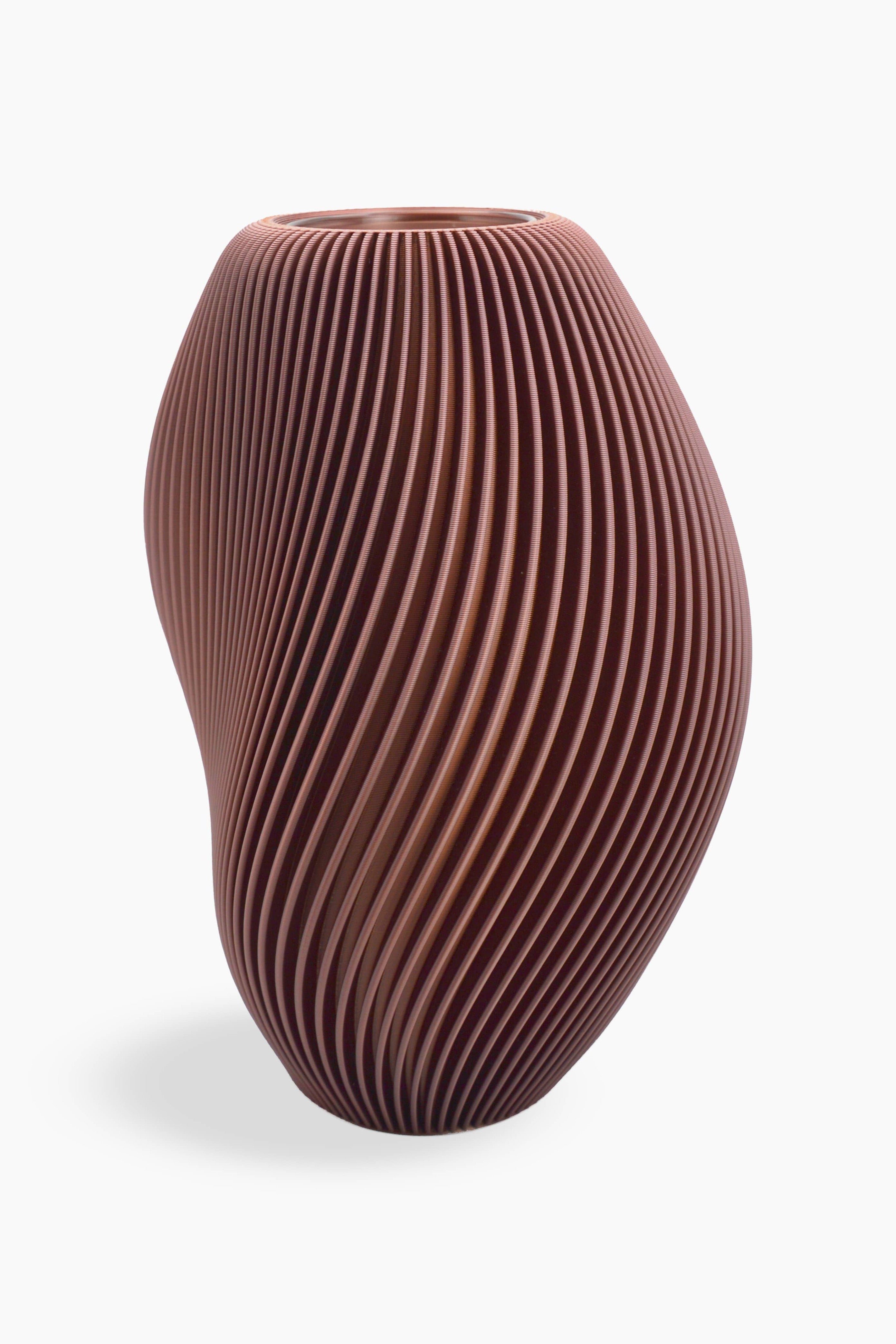 Vaso dalle linee sinuose moderno ed elegante color rame